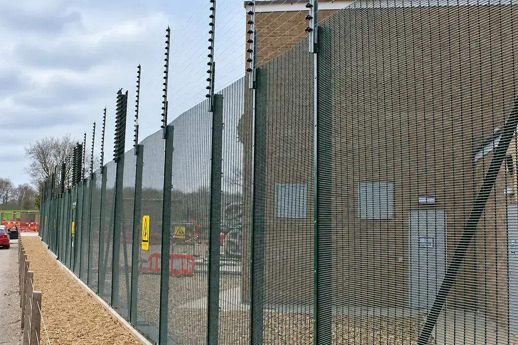 Security mesh fence run with posts and upper fence components