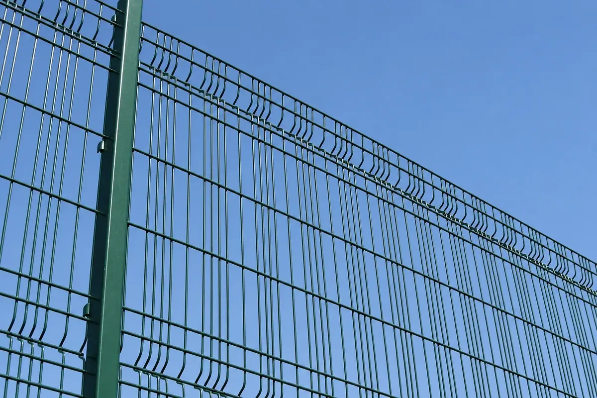 Profiled welded mesh fence showing V shaped bends beside a post
