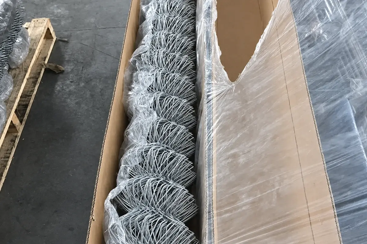 Chain link fabric bundled and protected inside a shipping carton