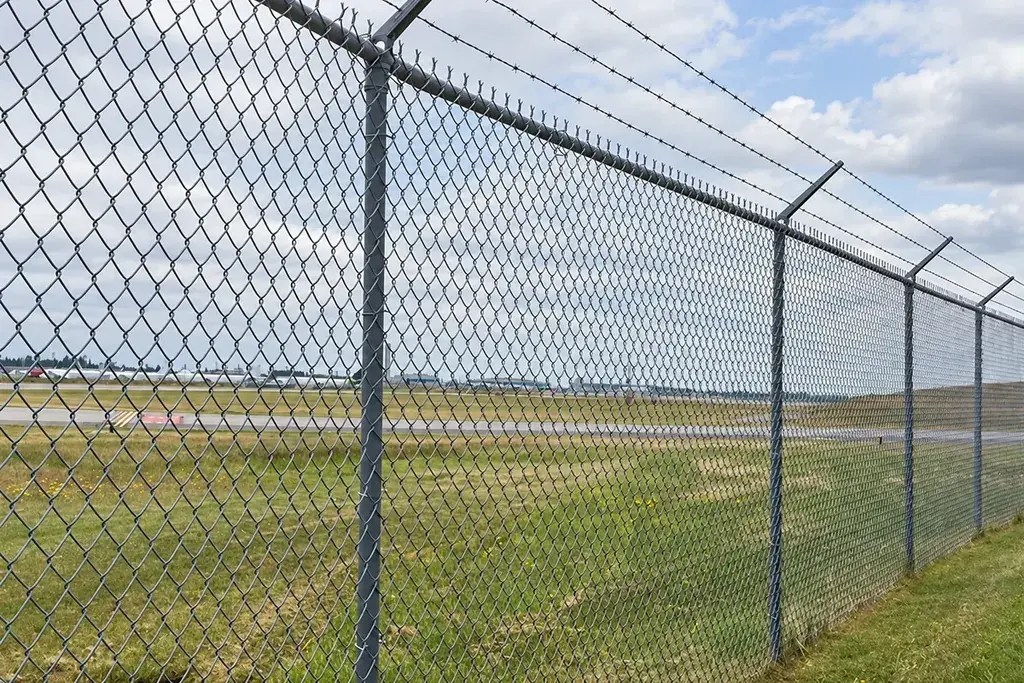 Installed chain link mesh showing regular diamond shaped openings