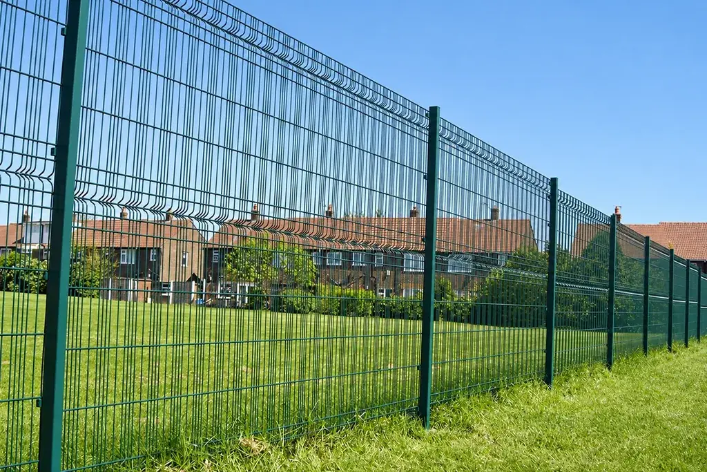 Installed welded mesh fence panels between evenly spaced posts