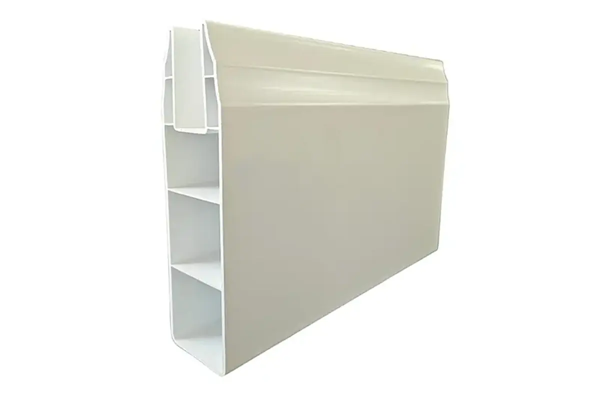 White hollow vinyl fence rail section showing internal ribs and a slotted edge