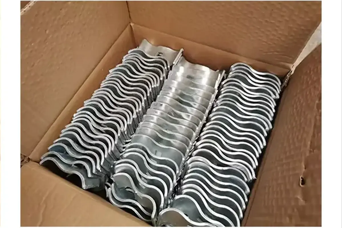 Fence panel clamps packed in grouped cartons for shipment