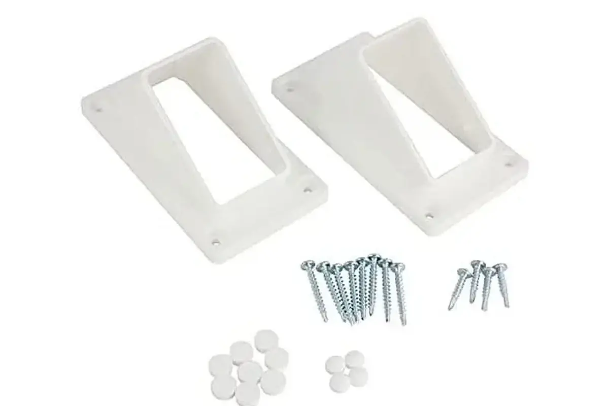 Fence railing hardware kit with two white fittings and separate screws and plastic pieces