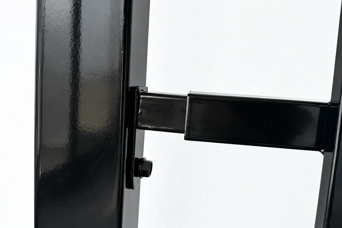 Close view of a coated steel fence rail joined to a post