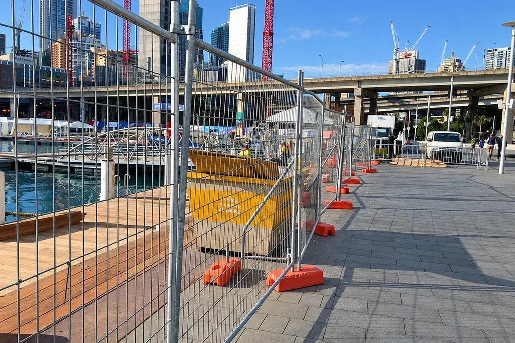 Framed temporary welded mesh fence panels around a construction work area