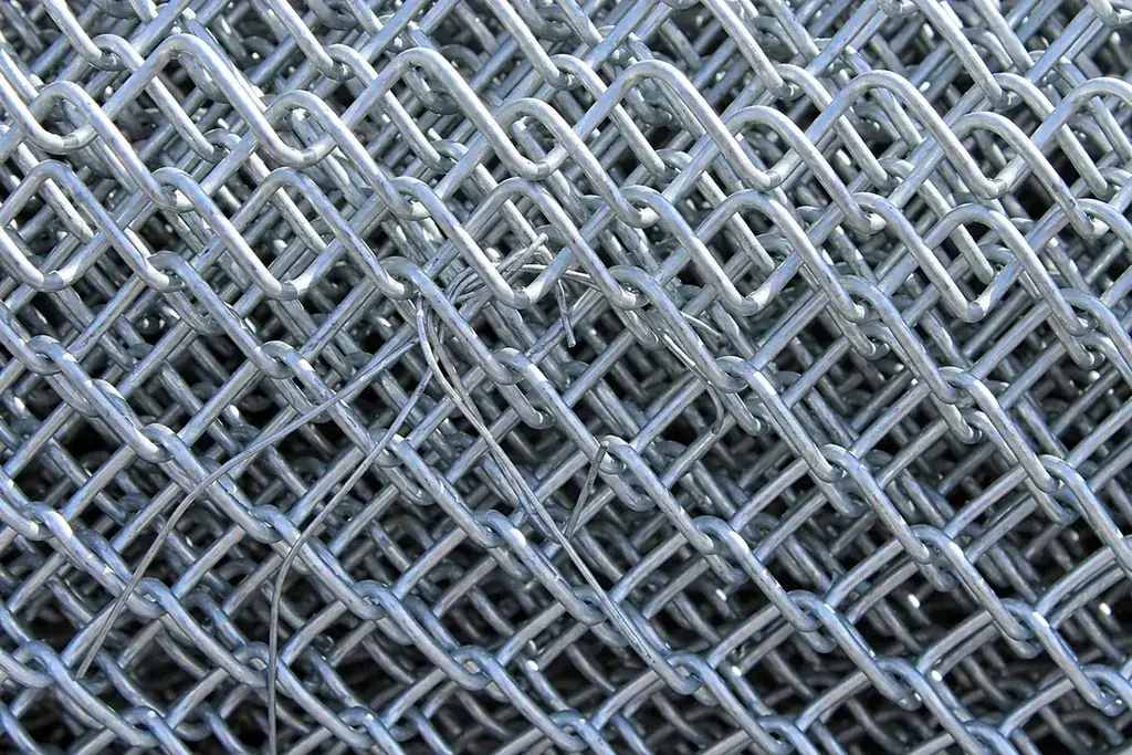 Close view of bundled galvanised chain-link fabric