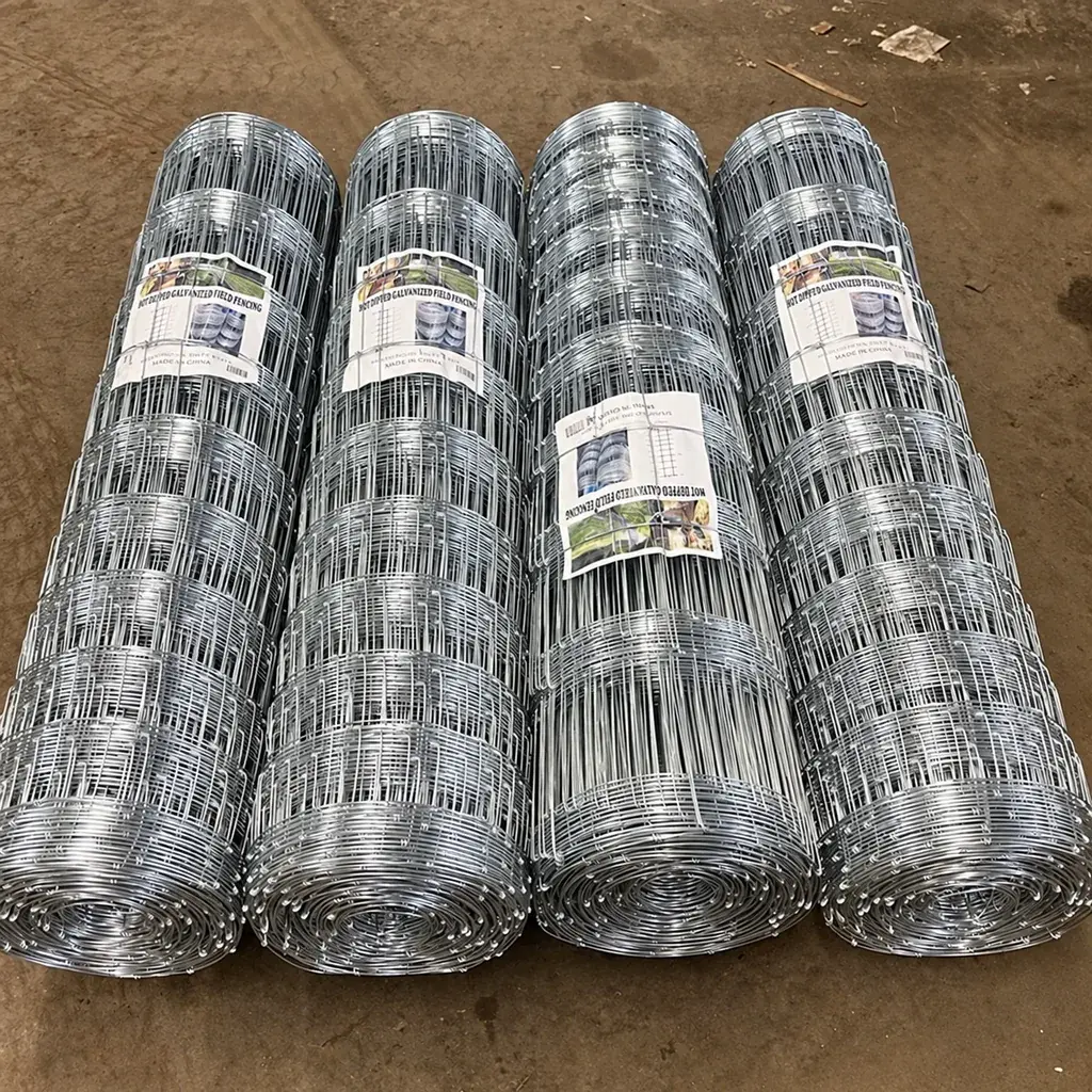 Four wrapped galvanised field fence rolls with individual product labels
