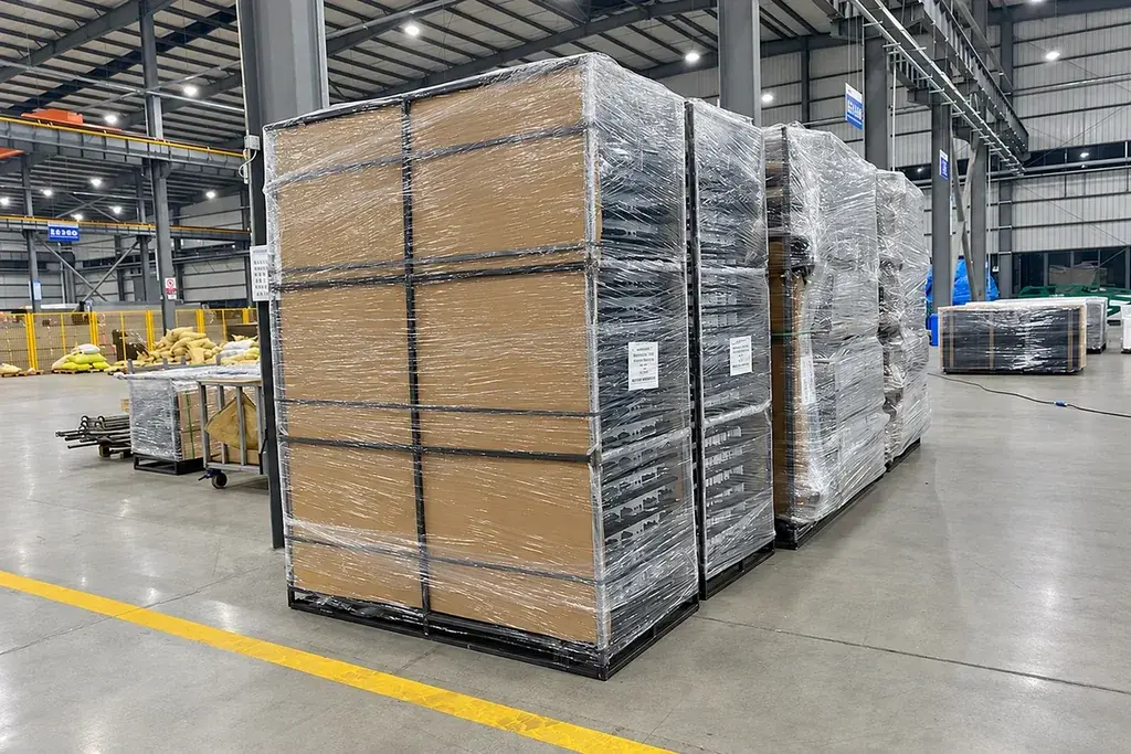 Wrapped pallets of fence sections with package labels