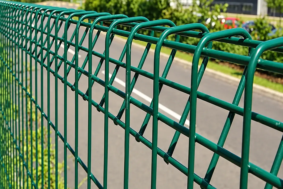Close view of formed green welded mesh panel wires
