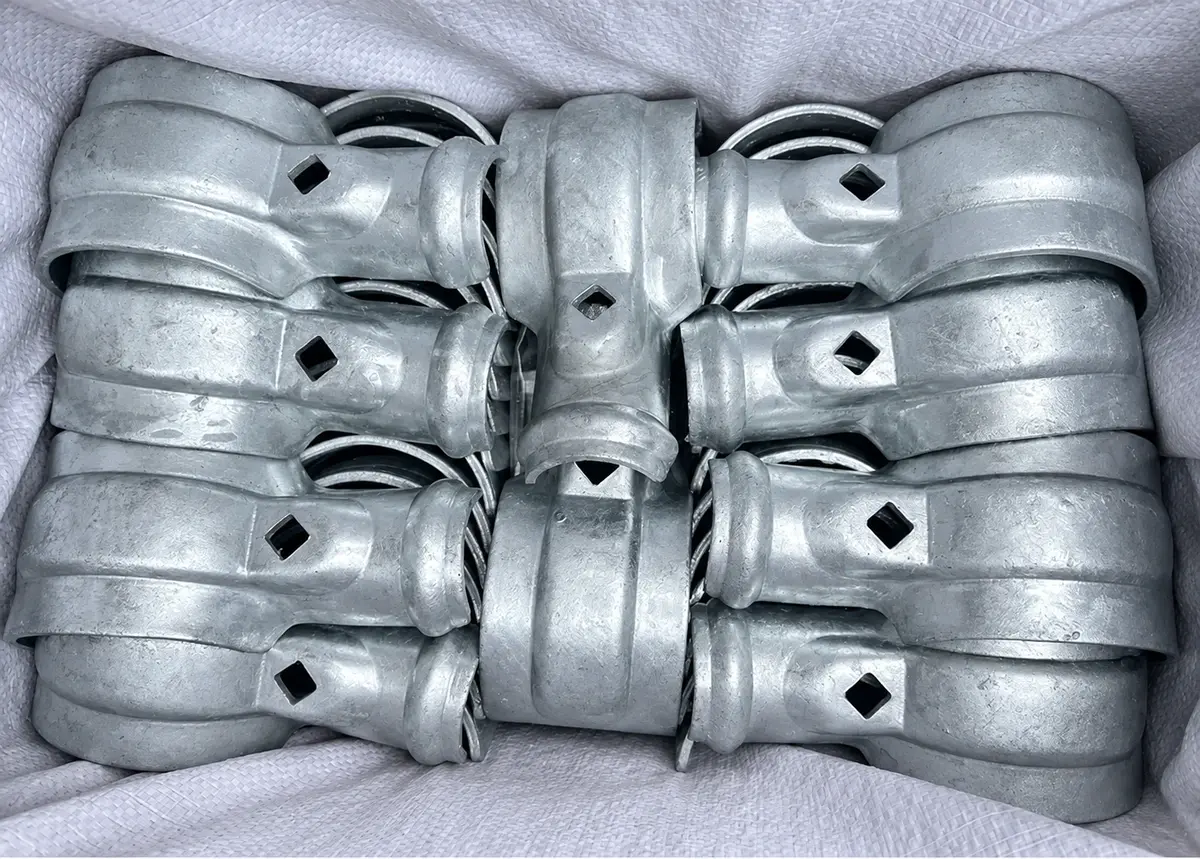 Galvanised fence clamps grouped for packing