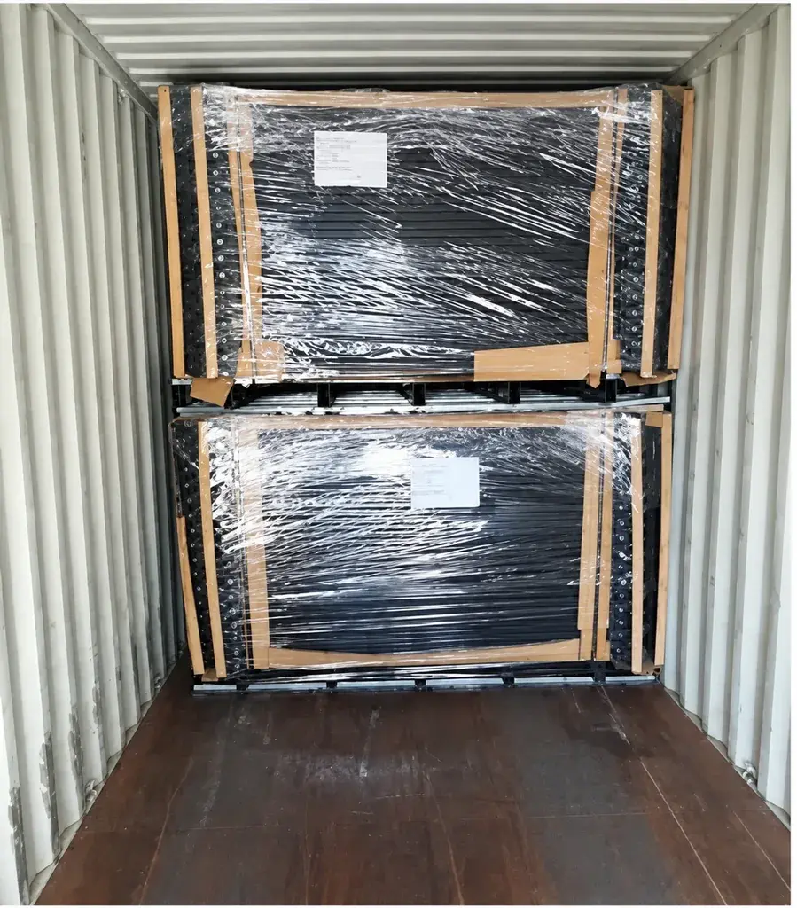 Wrapped fence packages positioned inside a shipping container