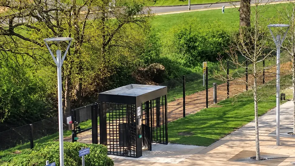 Separate pedestrian and vehicle entrances on a sloping site