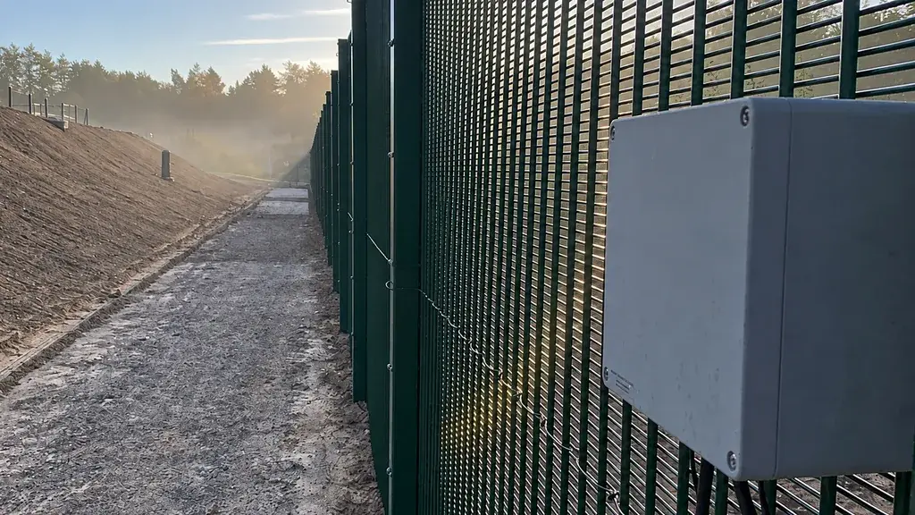 Security mesh perimeter with mounted monitoring equipment