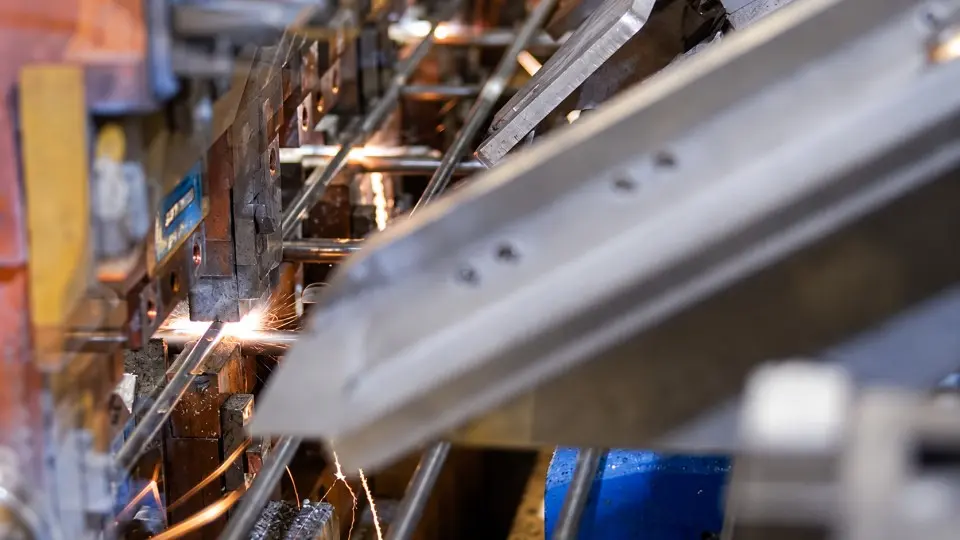 Close view of automated mesh welding equipment