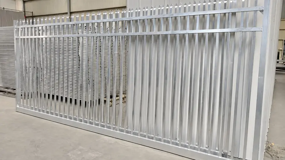 Assembled metal sliding gate standing in a workshop
