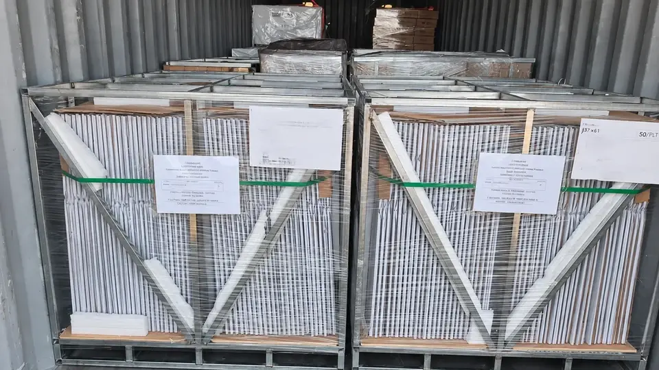 Packaged fence products inside a shipping container