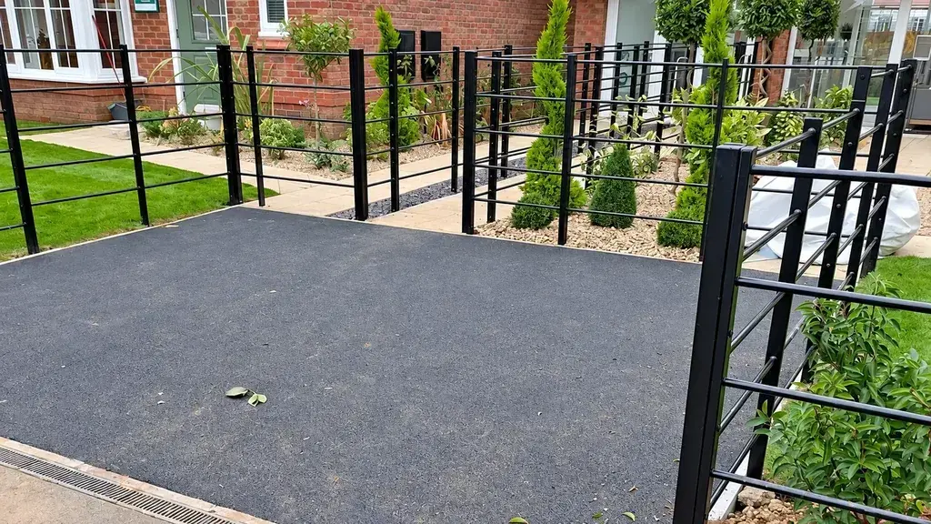 Metal gates and railings around a residential entrance path