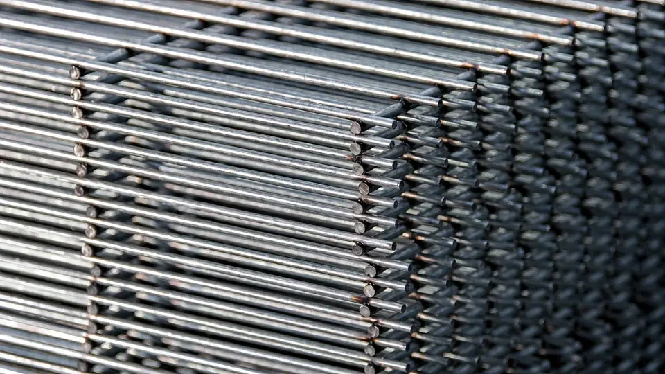 Stacked welded wire panels showing aligned steel wires