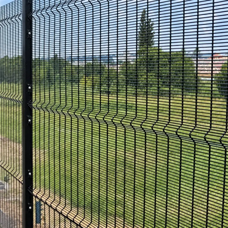 Dark close-spaced mesh fence with horizontal V-bends