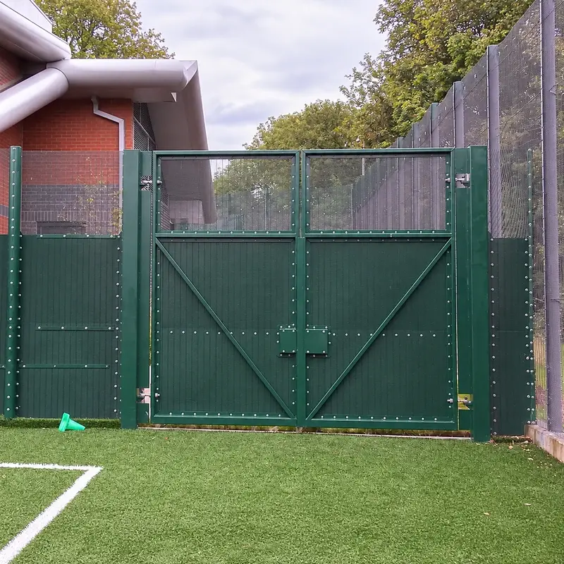 Green 358 mesh vehicle gate with two framed leaves