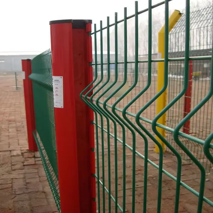 Green folded mesh panel attached to a red post