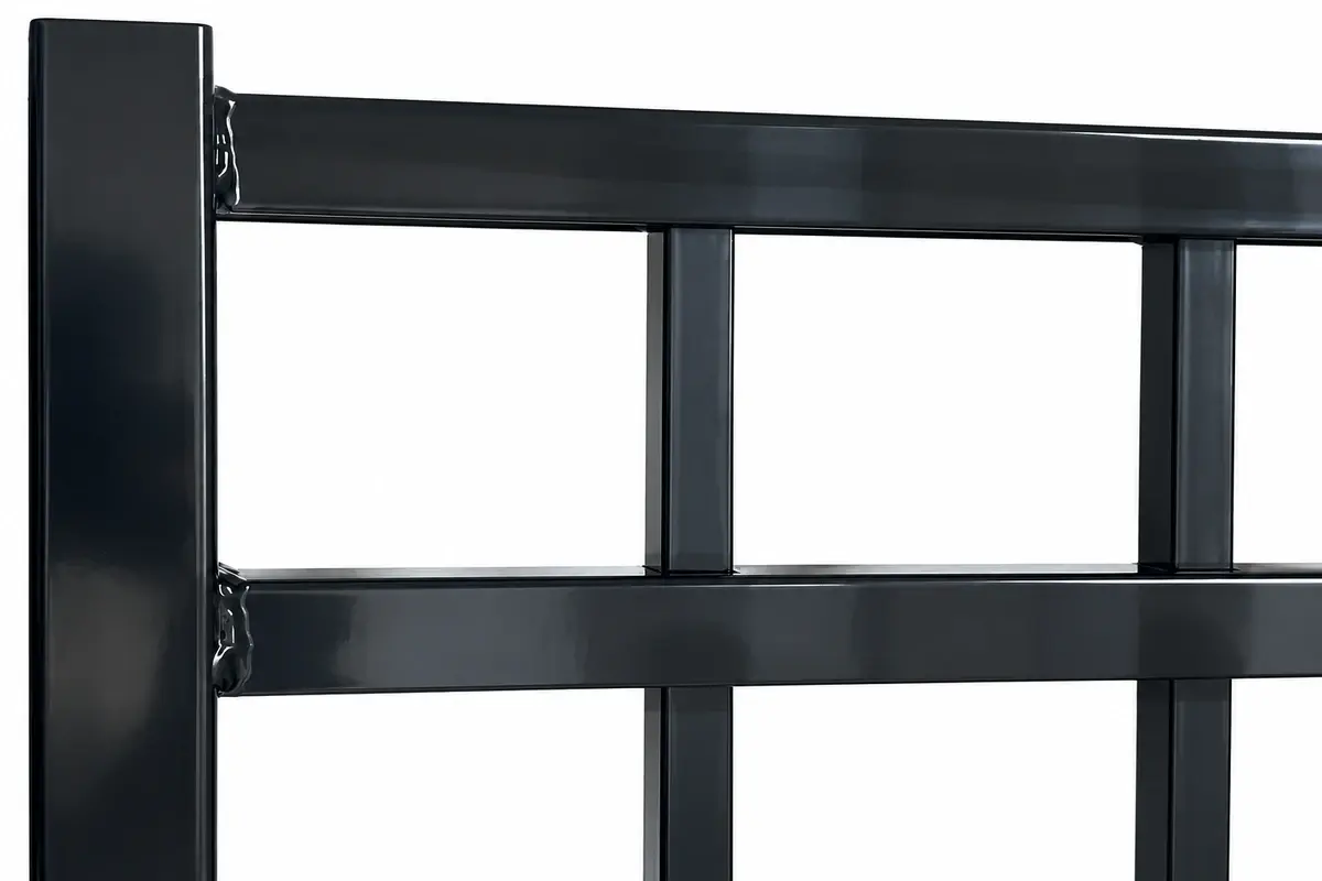 Close view of black aluminium pickets between horizontal rails