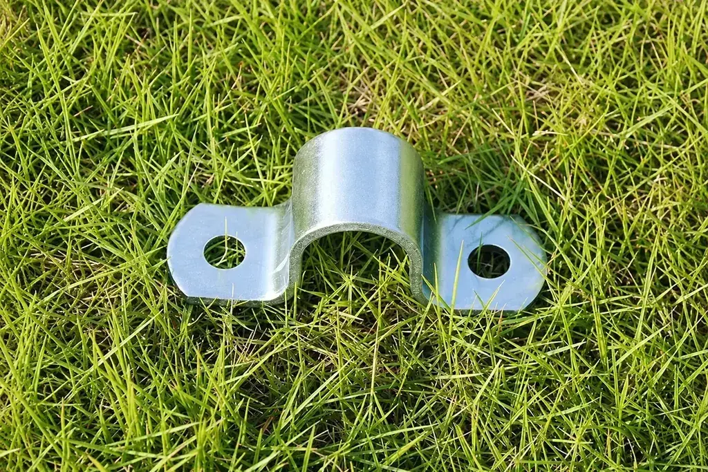 Small galvanised metal fence clip with two fixing holes