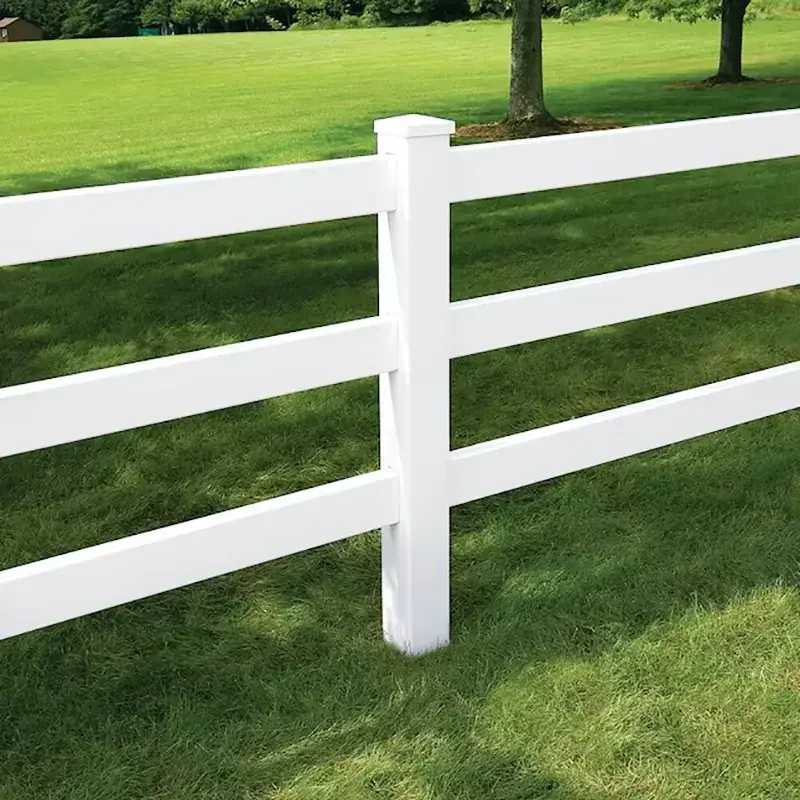 Flat white post caps along a ranch-style fence