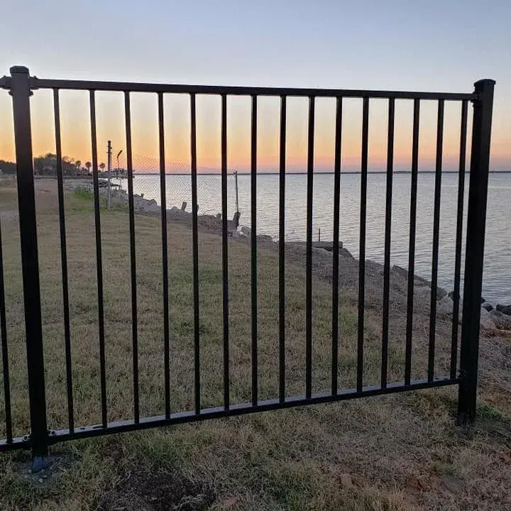 Black flat top steel railing panel showing its horizontal rails