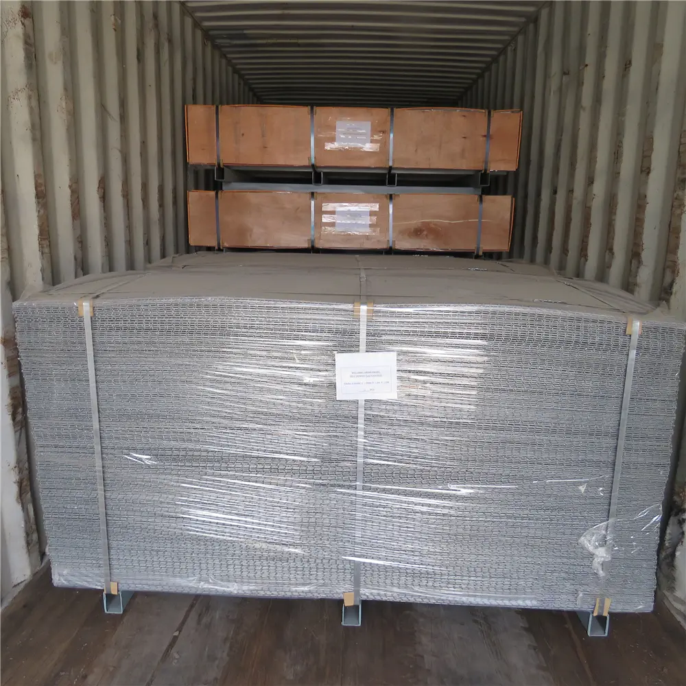 Wrapped bundles of welded mesh panels inside a shipping container
