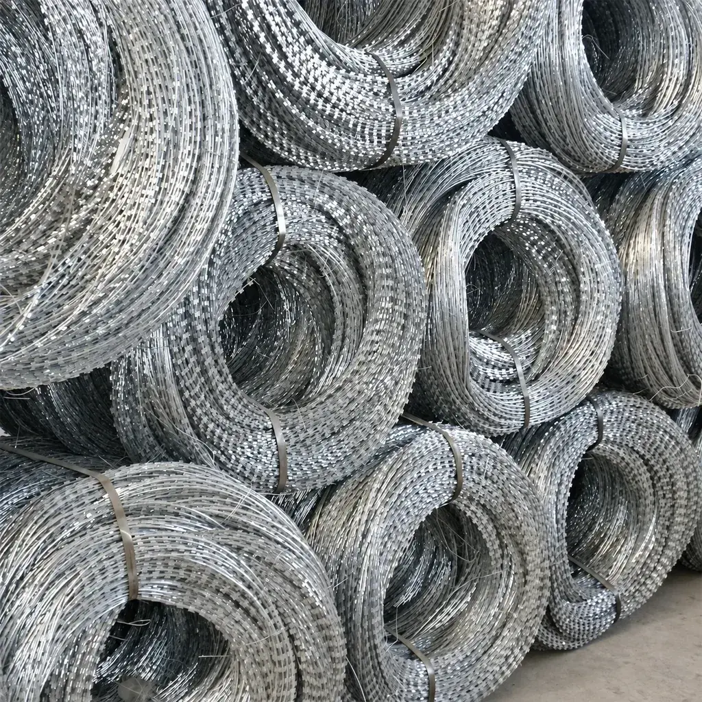 Stacked coils of concertina razor wire
