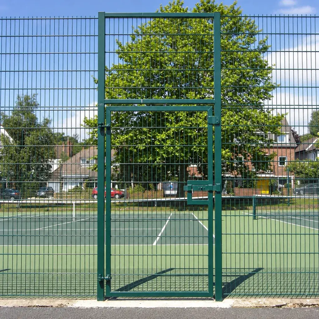 Green double-wire mesh gate at a sports enclosure