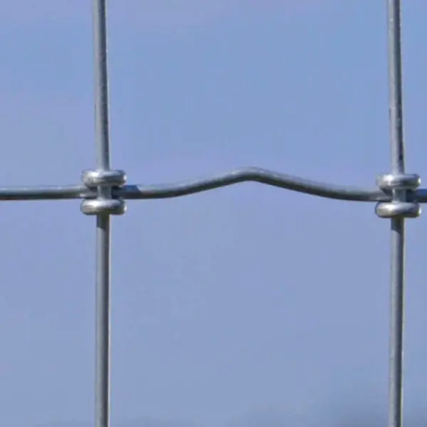 Close-up of S-knot wire junctions in woven field fencing