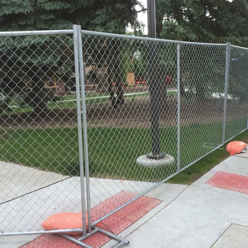 Temporary chain link panel with framed mesh, base and connecting post